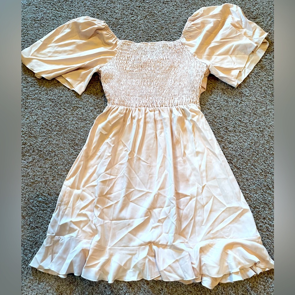 Women’s size medium, cream colored smocked dress